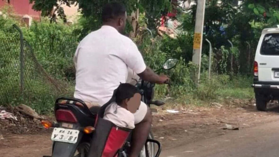 బైక్ సైడ్ బాక్స్‌లో బాబును కూర్చోబెట్టి తండ్రి ప్రయాణం.. క్లాస్ పీకిన పోలీసులు